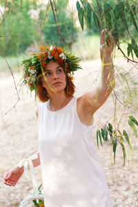 Woman looking at tree