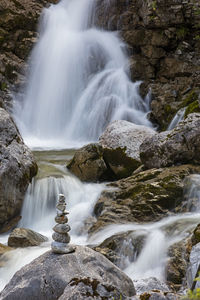 Scenic view of waterfall in forest