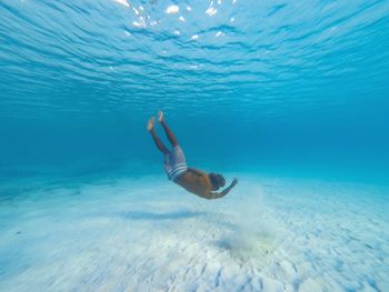 Man swimming in sea