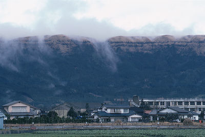 View of landscape against cloudy sky