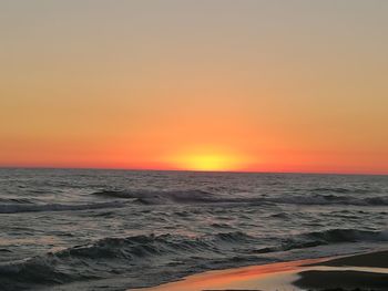 Scenic view of sunset over sea