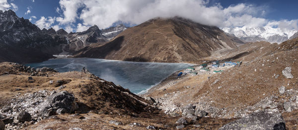 Panoramic view of snowcapped mountains against sky