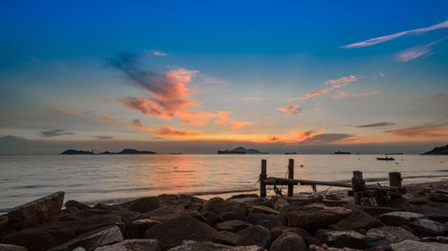 Scenic view of sea against sky during sunset