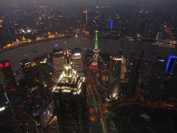 High angle view of city buildings at night