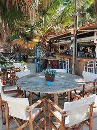 Chairs and tables in swimming pool