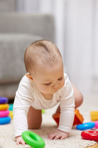 Boy playing with toy blocks