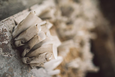 High angle view of old stack on wood