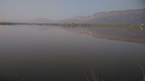 Scenic view of lake against sky