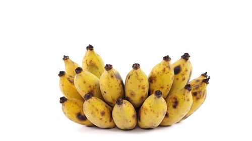 Close-up of fruits against white background