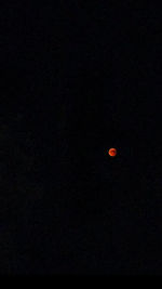 Low angle view of moon against sky at night