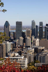 Modern buildings in city against sky