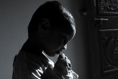 Portrait of boy looking at home