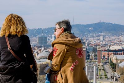 Panoramic view of cityscape against sky during winter