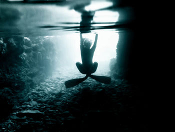 Man swimming in sea