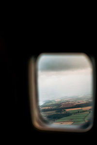 View of landscape through airplane window