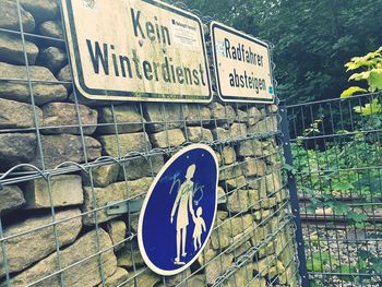 Warning sign on road