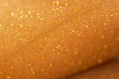 Gold glittering defocused background