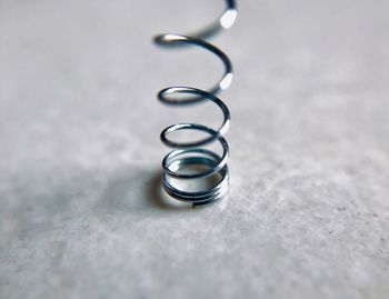 Close-up of wedding rings on table