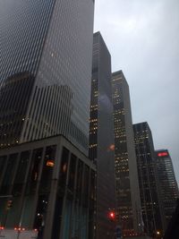 Low angle view of skyscrapers in city