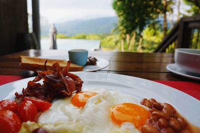 Close-up of breakfast served on table