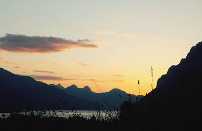 Scenic view of mountains at sunset