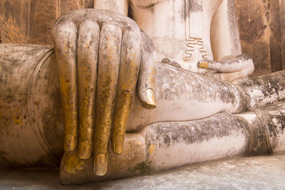 Close-up of buddha statue in temple