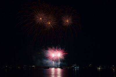 Firework display at night