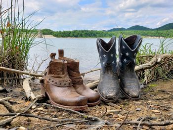 High angle view of shoes on beach