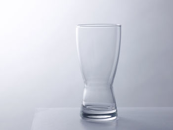 Design glass with body shape empty glass on the white background