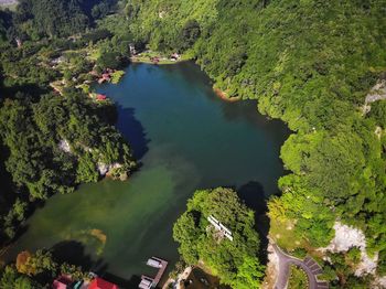 Aerial view of green landscape and lake