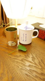 Close-up of coffee cup on table