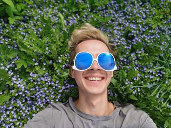 Portrait of smiling man wearing sunglasses