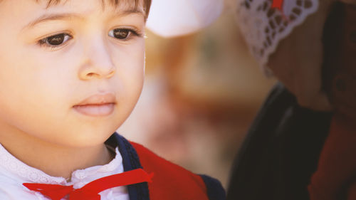 Portrait of cute boy looking away