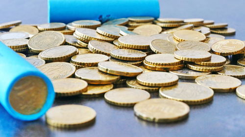 Close-up of coins on table