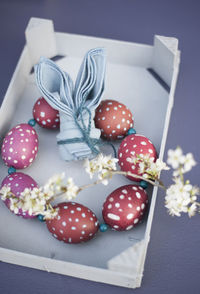 High angle view of cupcakes in box on table