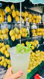 Close-up of lemon fruits and lemonade 