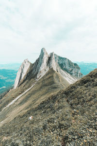 Scenic view of mountain range against sky