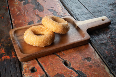 High angle view of bread on cutting board
