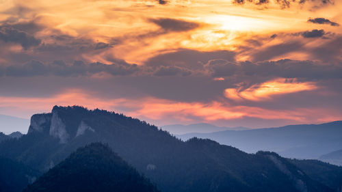 Scenic view of mountains against sky during sunset