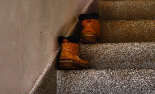 High angle view of shoes on wall