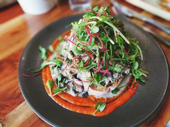 High angle view of vegetables in plate on table