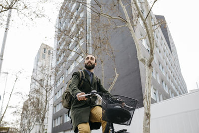 Man riding e-bike in the city