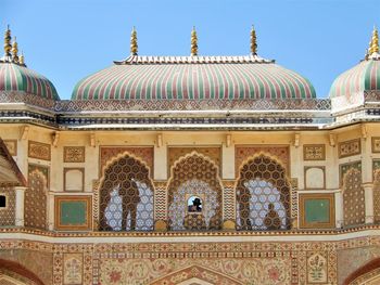 View of temple building against clear sky