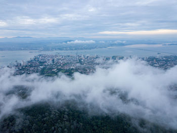 High angle view of buildings in city against sky