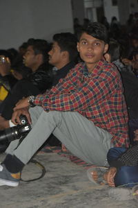 Portrait of a young couple sitting