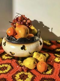 Close-up of fruits in bowl on table