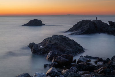Scenic view of sea against sky during sunset
