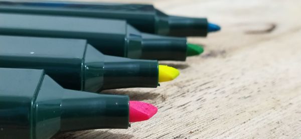 Close-up of colored pencils on table