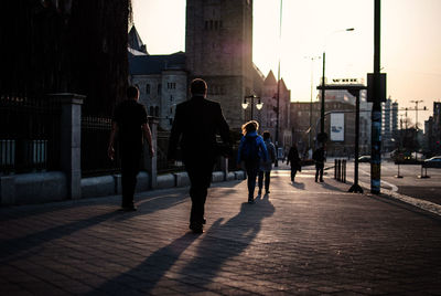 People walking on city street