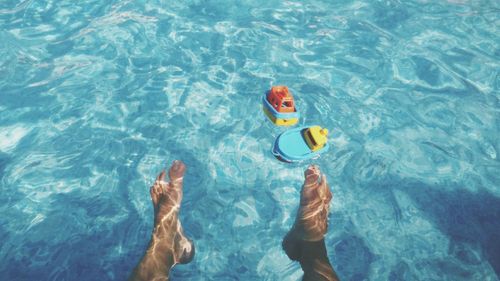 High angle view of toys in swimming pool